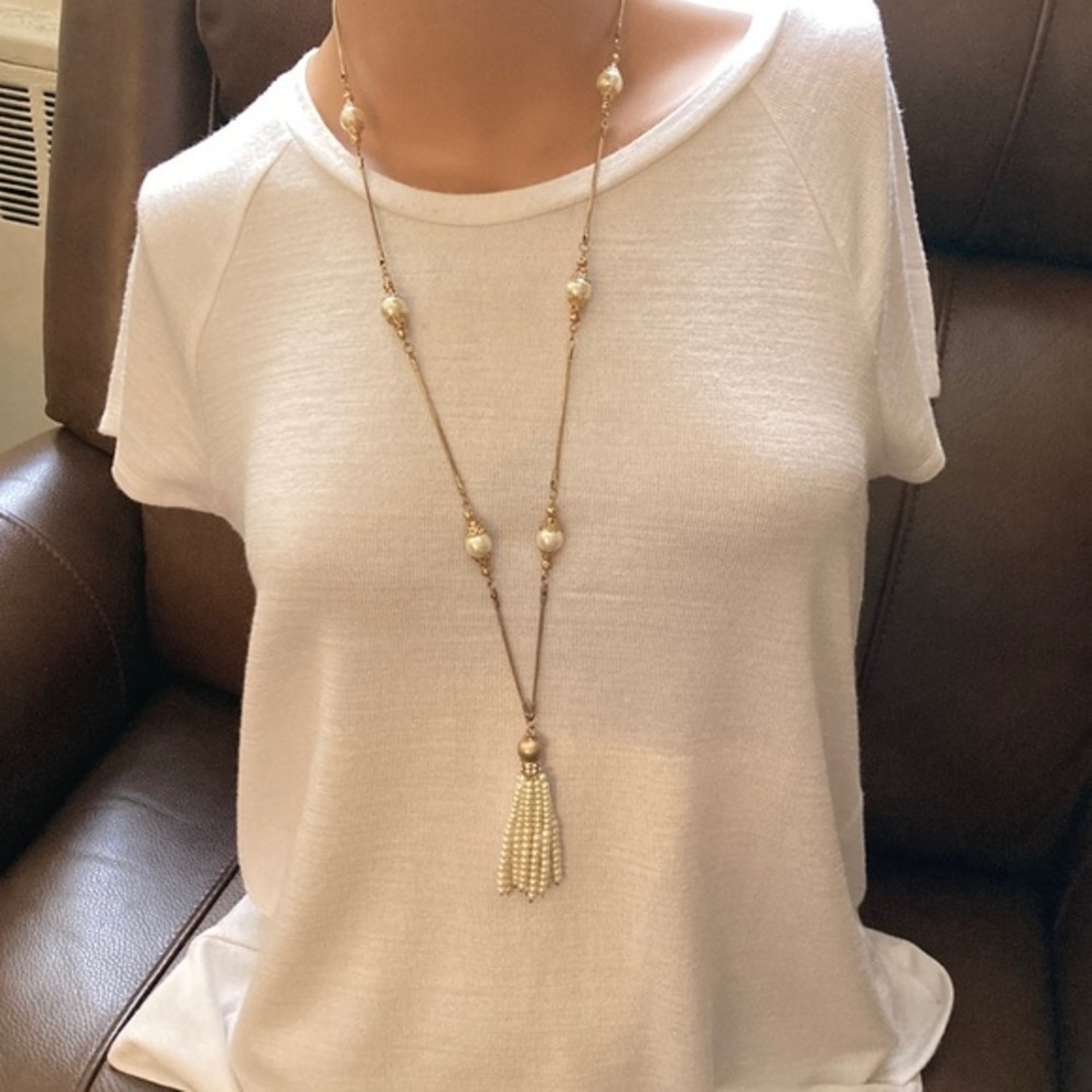 Gold tone rhinestone and faux pearl tassel necklace